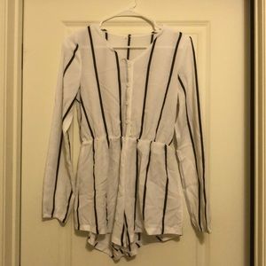 White and black striped long sleeve romper